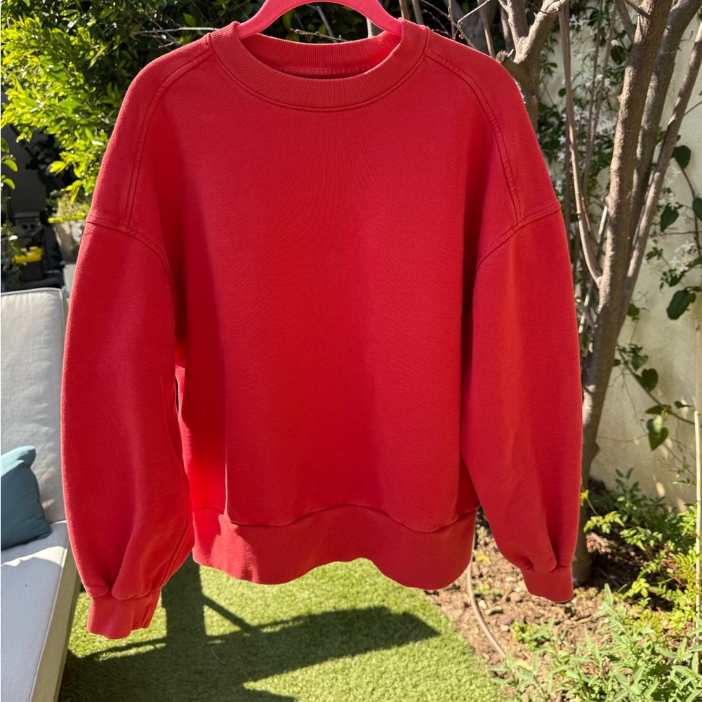 Everlane vibrant red sweatshirt.
